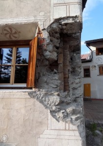 Damaged house in Pradela hamlet